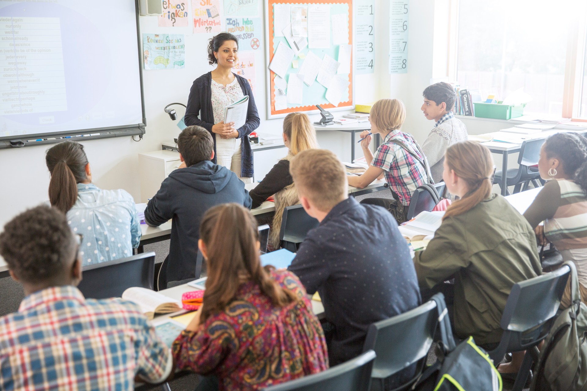 Teacher and students in classroom during lesson